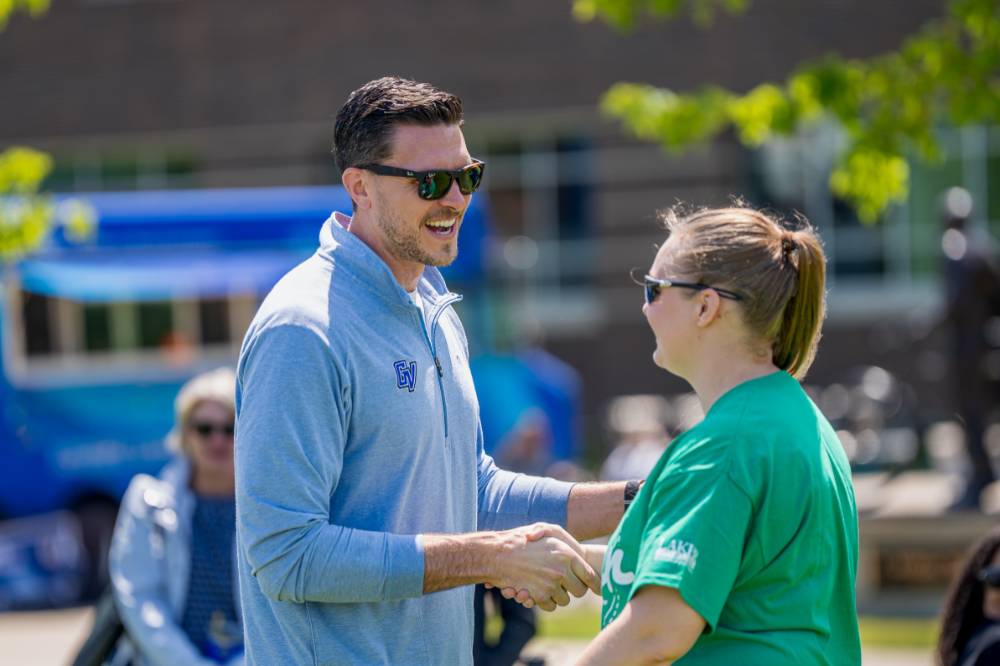 Players smile and shake hands at the end of the Tournament